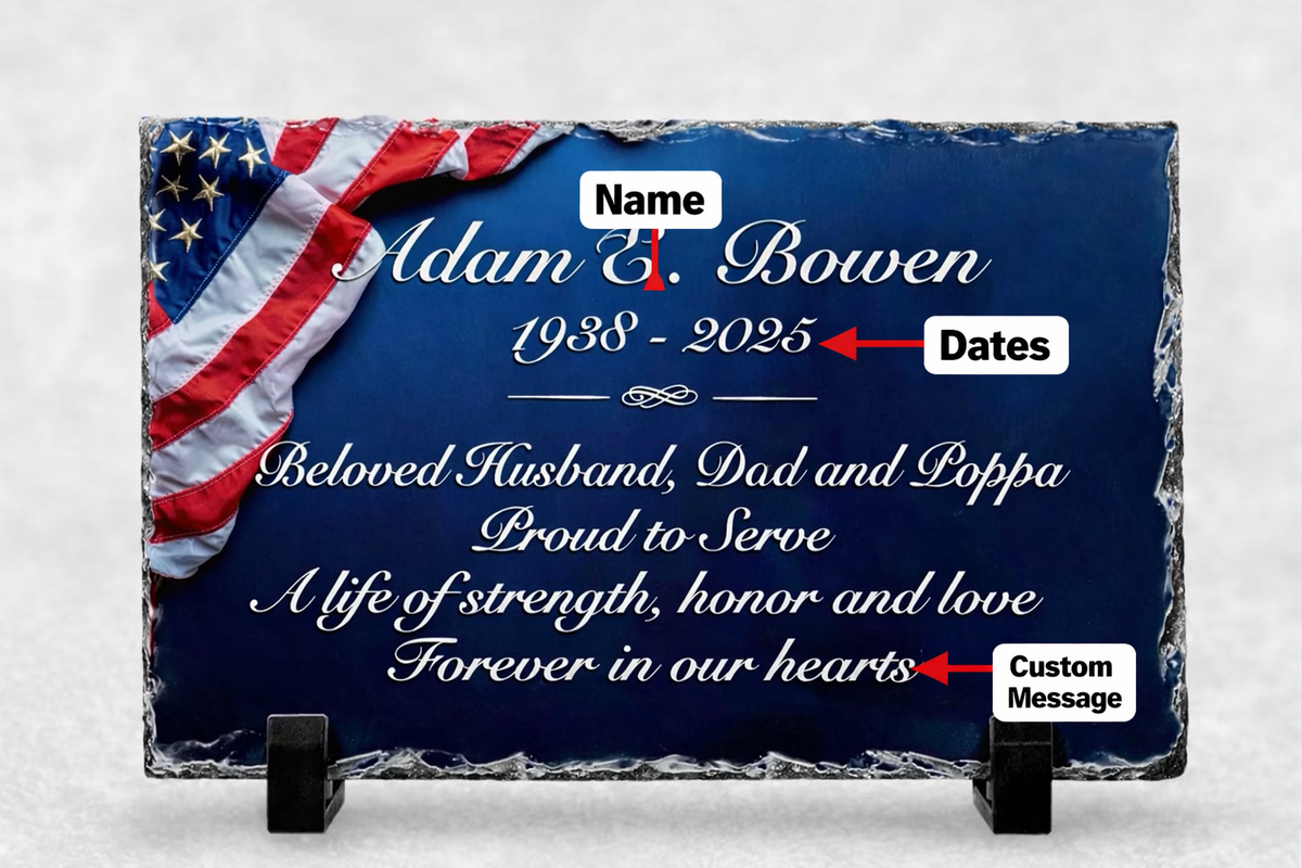 Personalization guide for a patriotic memorial slate with American flag artwork, sample name and dates, custom-message callouts and black stands.