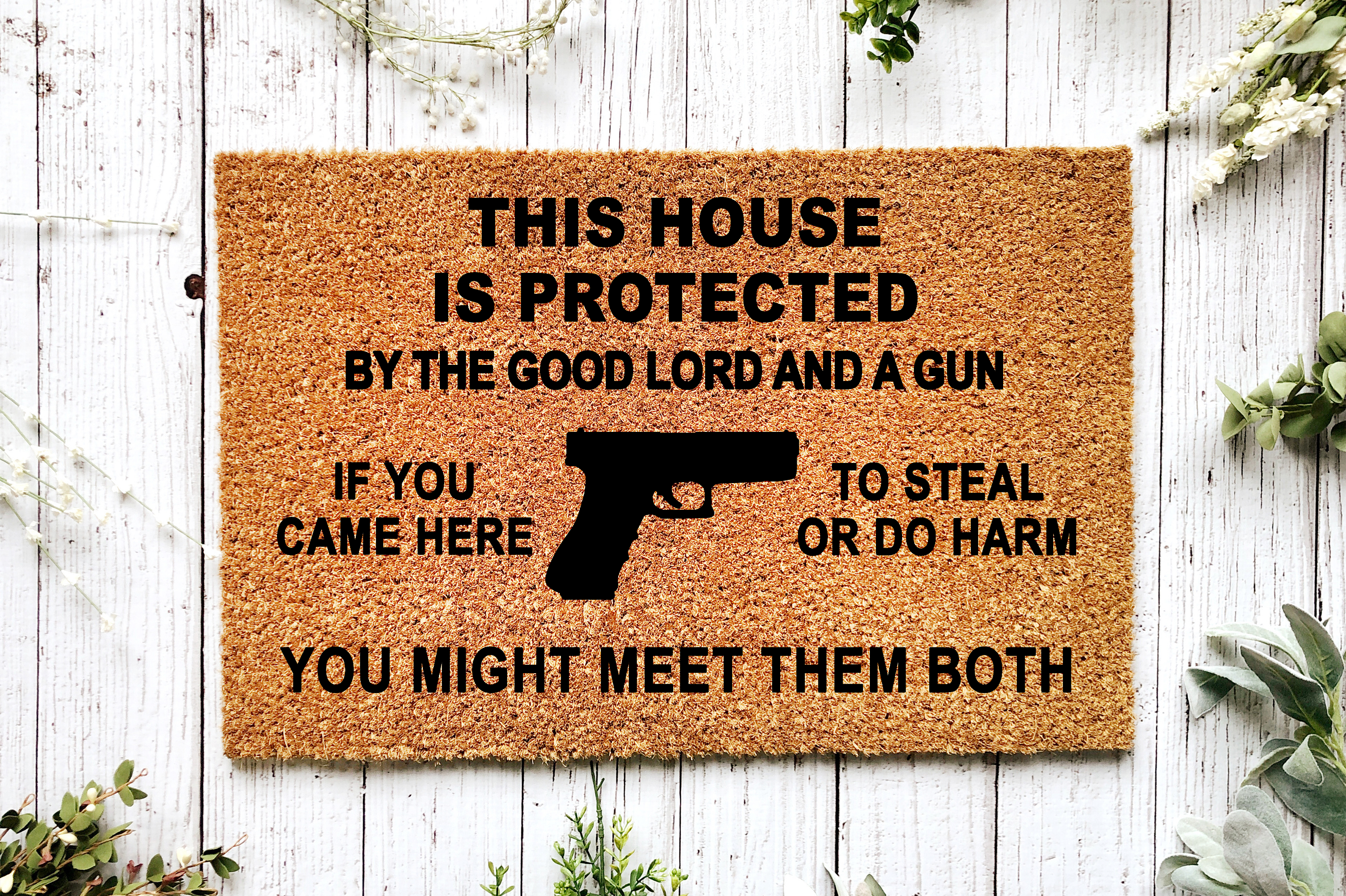 Doormat - THIS HOUSE IS PROTECTED BY THE GOOD LORD AND A GUN