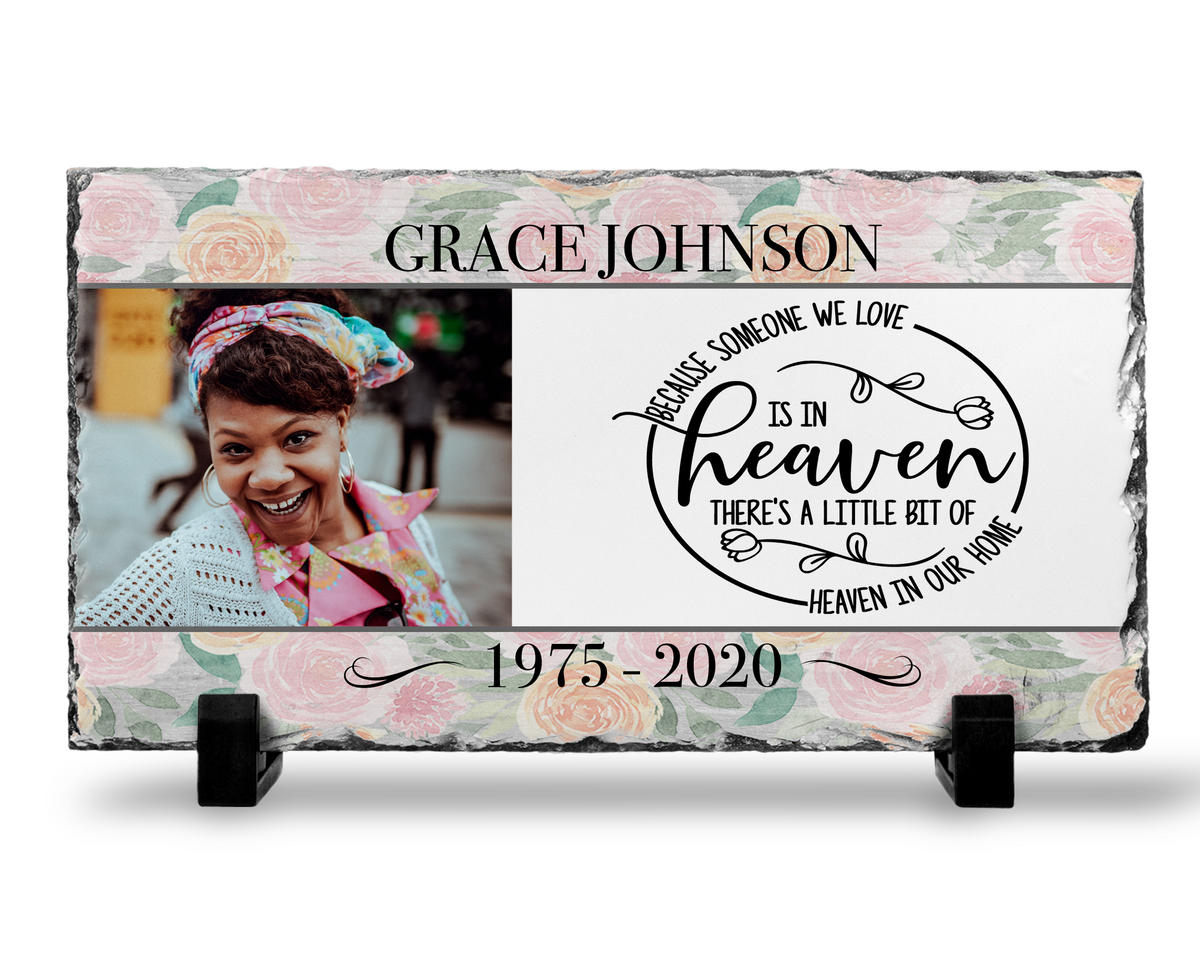 Photo slate with pink flowers and Because Someone We Love Is in Heaven wording