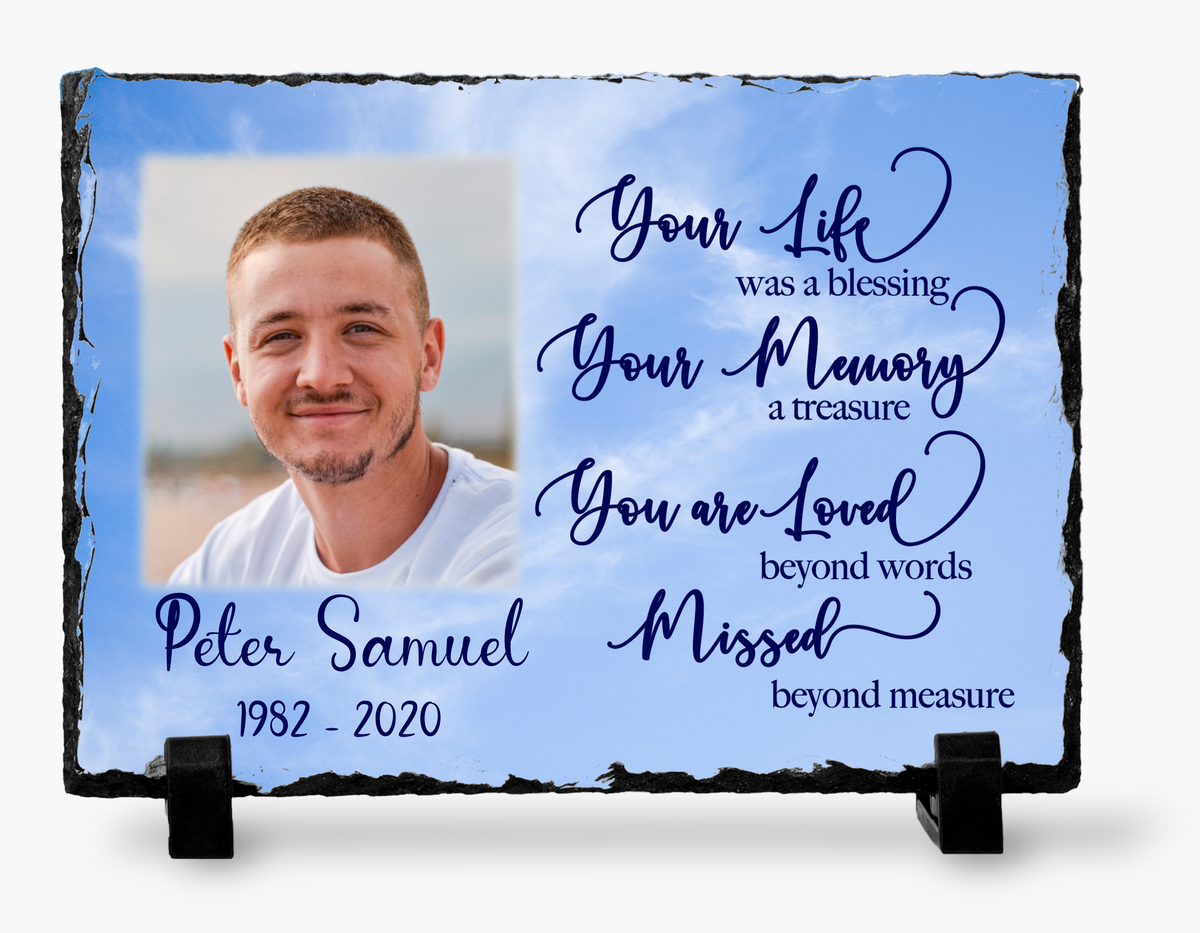 Blue-sky Your Life, Your Memory memorial photo slate with a man's portrait, personalized name and dates, tribute wording and black display stands.